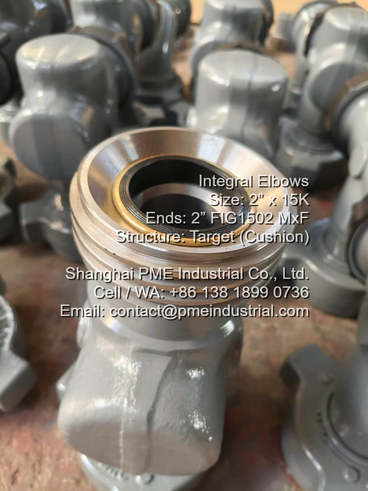 Cross-section view of a 15000 PSI cushion elbow showing the blind block buffer chamber for erosion resistance.